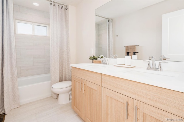 full bathroom with vanity, shower / bathtub combination with curtain, and toilet