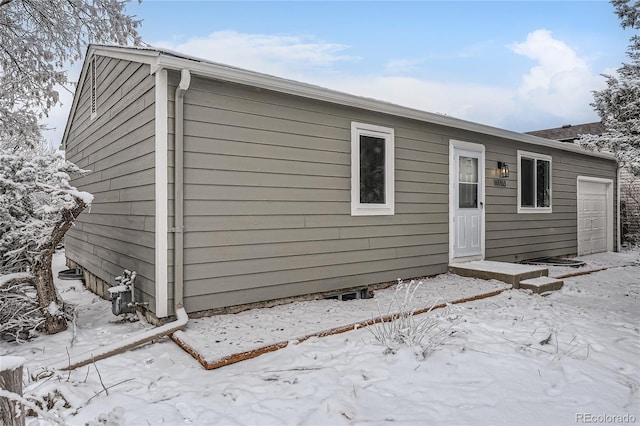 exterior space with a garage