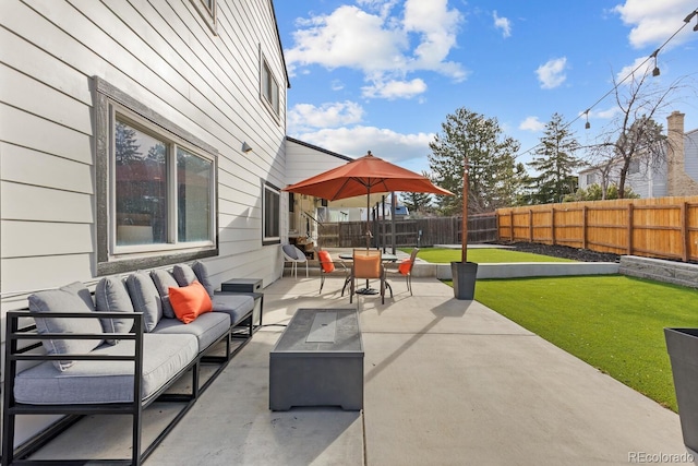 view of patio featuring outdoor lounge area and a fenced backyard