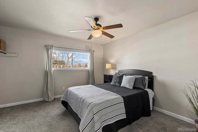 carpeted bedroom with baseboards and ceiling fan