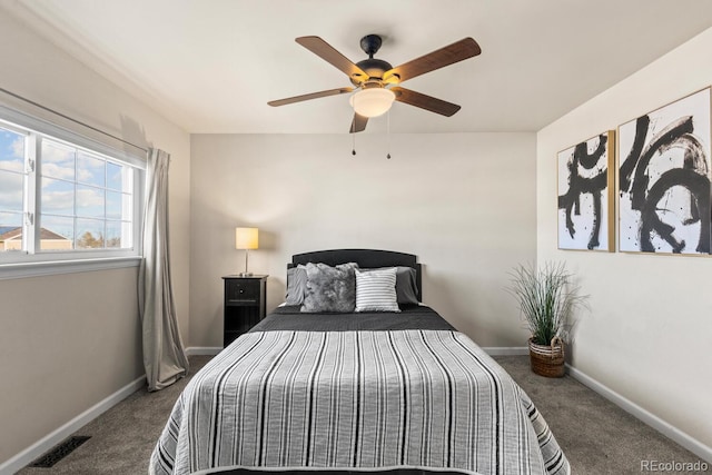 bedroom featuring carpet, visible vents, and baseboards