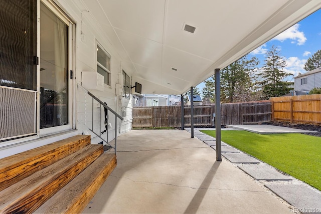 view of patio / terrace featuring entry steps and a fenced backyard