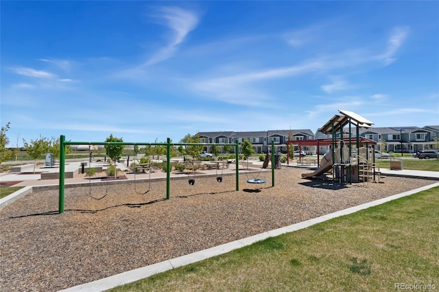community jungle gym with a residential view