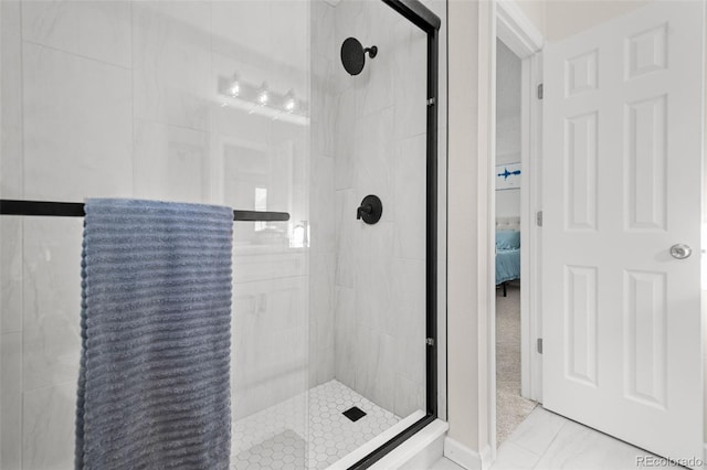 bathroom featuring an enclosed shower