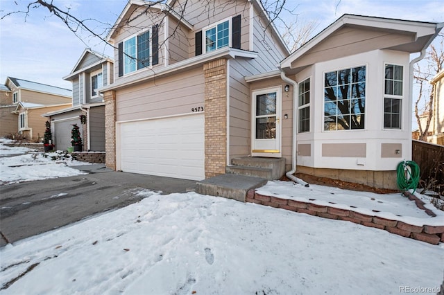 view of front of property featuring a garage