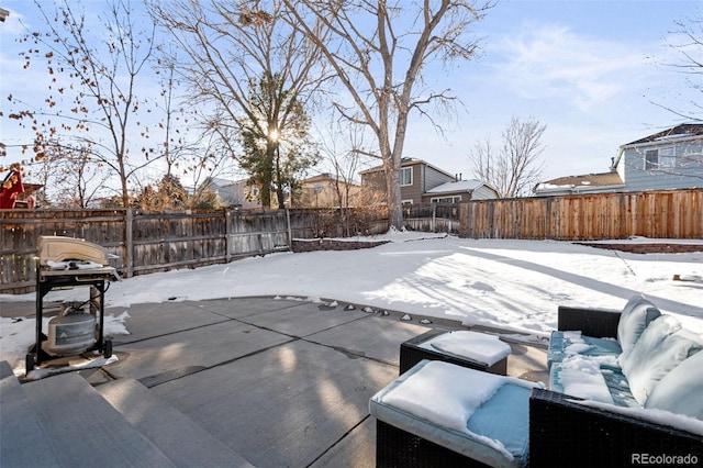 view of snow covered patio