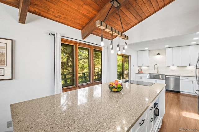 kitchen featuring dishwasher, hanging light fixtures, wooden ceiling, white cabinetry, and light wood-type flooring