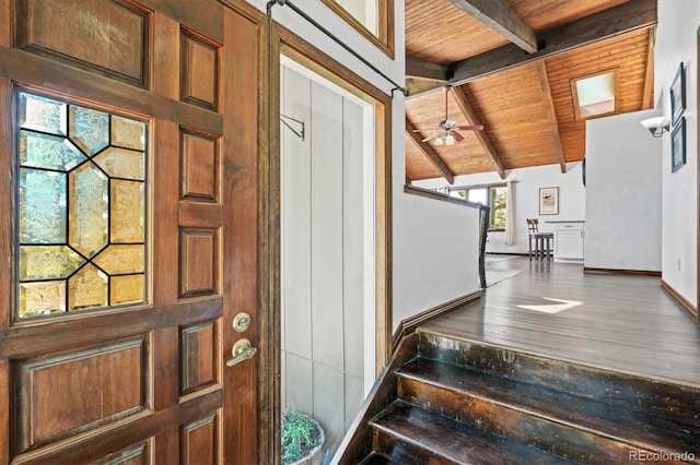 doorway to property featuring ceiling fan