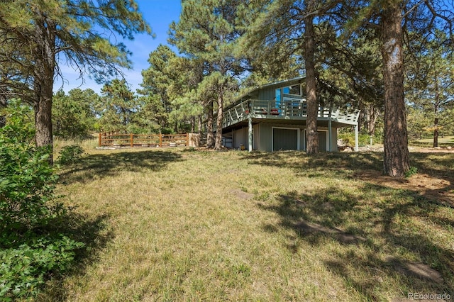 view of yard with a deck