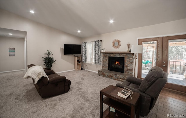 11030 Pine Meadows Rd, Colorado Springs, CO 80908 - carpeted living area with a fireplace, vaulted ceiling, and recessed lighting