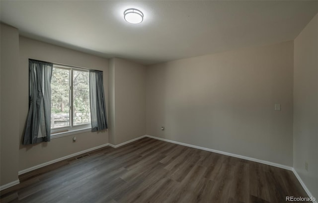 11030 Pine Meadows Rd, Colorado Springs, CO 80908 - empty room featuring wood finished floors