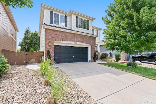 7853 S Jasper Way, Englewood, CO 80112 - traditional-style home with brick siding, an attached garage, and concrete driveway