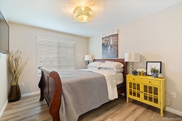 7853 S Jasper Way, Englewood, CO 80112 - bedroom with wood finished floors and baseboards