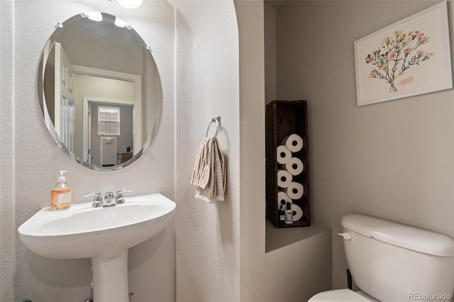 7853 S Jasper Way, Englewood, CO 80112 - half bathroom with toilet