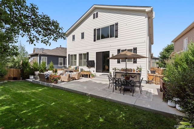 7853 S Jasper Way, Englewood, CO 80112 - back of property with an outdoor hangout area, a patio, and a fenced backyard