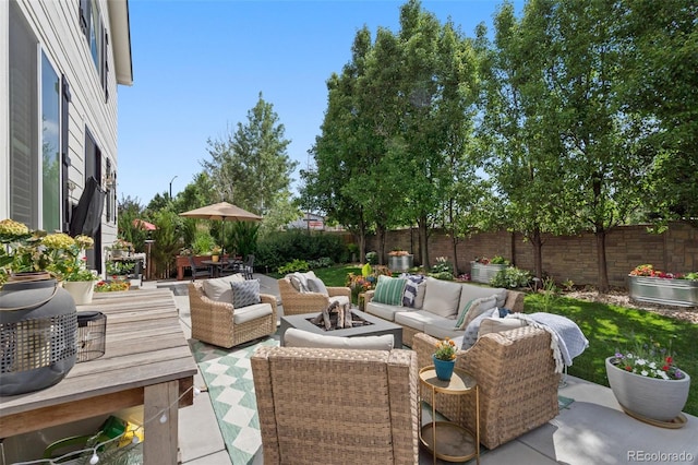 7853 S Jasper Way, Englewood, CO 80112 - fenced backyard featuring outdoor lounge area and a patio