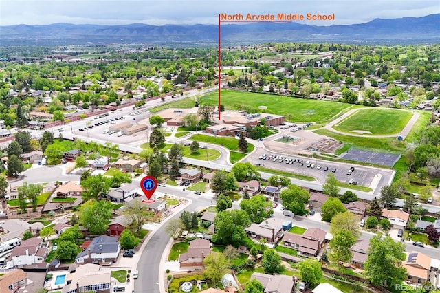 7260 Otis Ct, Arvada, CO 80003 - aerial perspective of suburban area featuring a mountain backdrop