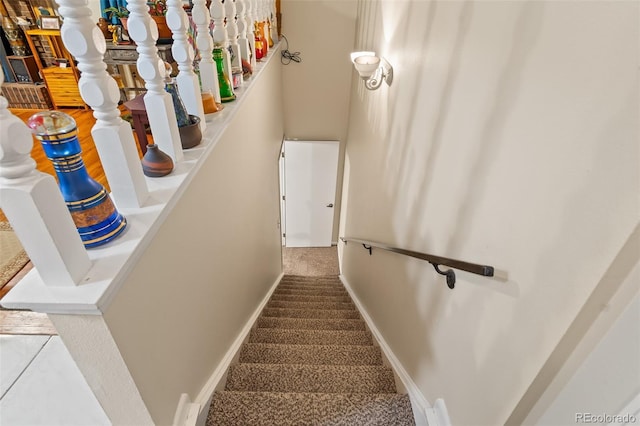 7260 Otis Ct, Arvada, CO 80003 - stairs featuring carpet floors