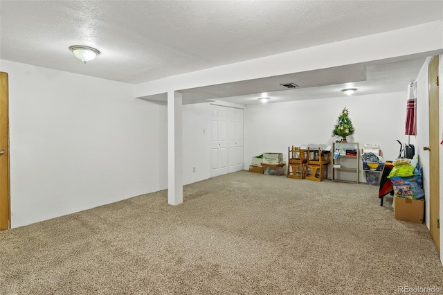 7260 Otis Ct, Arvada, CO 80003 - finished basement with carpet floors and a textured ceiling