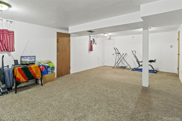 7260 Otis Ct, Arvada, CO 80003 - finished below grade area featuring carpet flooring and a textured ceiling