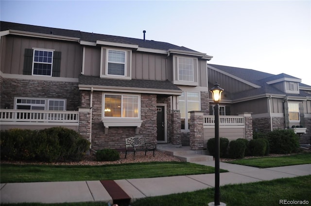 4746 Raven Run, Broomfield, CO 80023 - view of front of home with stone siding and board and batten siding