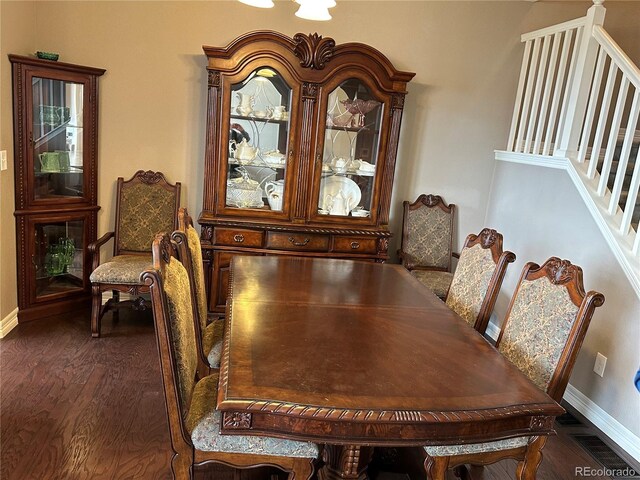4746 Raven Run, Broomfield, CO 80023 - dining room featuring dark wood-type flooring, visible vents, and baseboards