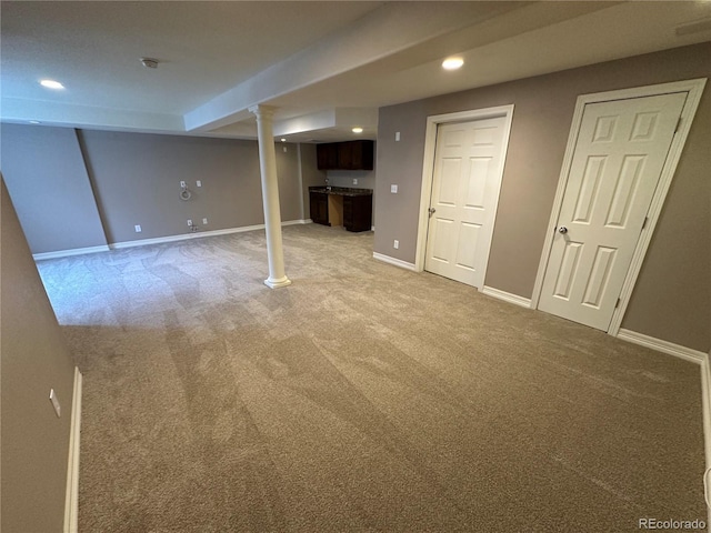 4746 Raven Run, Broomfield, CO 80023 - finished below grade area with bar, baseboards, light colored carpet, and recessed lighting