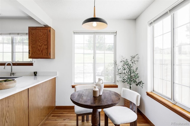 2040 S Xenia Way, Denver, CO 80231 - dining space featuring wood finished floors and baseboards