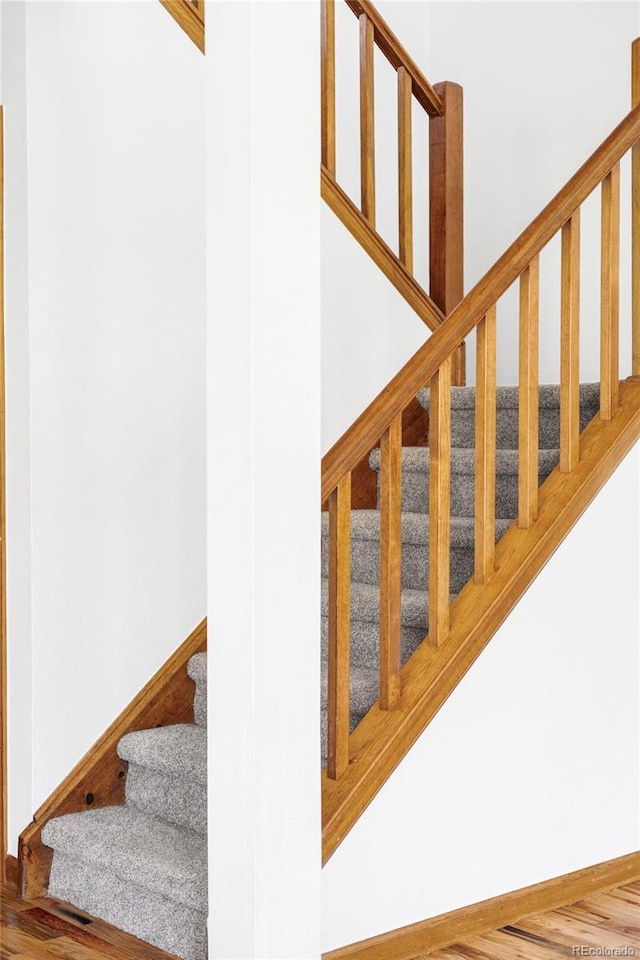 2040 S Xenia Way, Denver, CO 80231 - staircase with wood finished floors