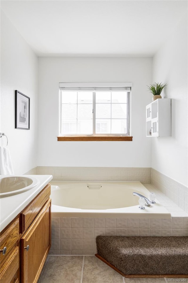 2040 S Xenia Way, Denver, CO 80231 - full bathroom with a garden tub, vanity, and tile patterned floors
