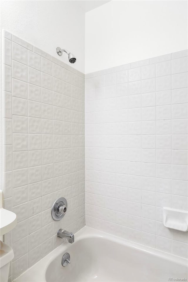 2040 S Xenia Way, Denver, CO 80231 - bathroom featuring bathing tub / shower combination