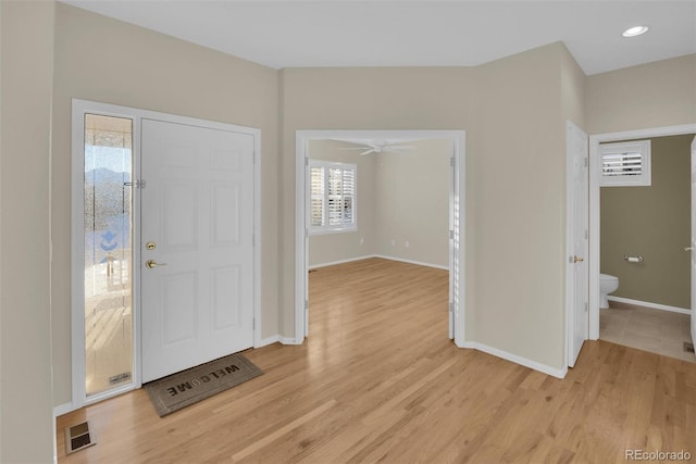 foyer with light hardwood / wood-style flooring