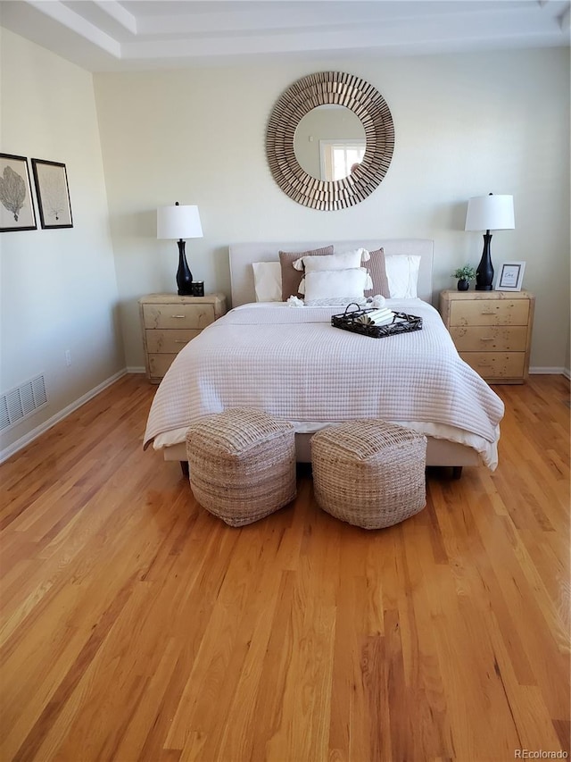 bedroom featuring light wood-type flooring