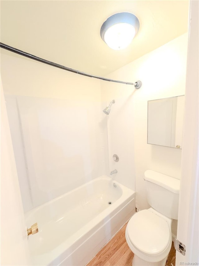 1302 S Parker Rd Unit 134, Denver, CO 80231 - bathroom featuring bathtub / shower combination and wood finished floors
