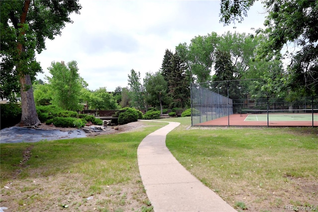 1302 S Parker Rd Unit 134, Denver, CO 80231 - view of community with a tennis court and view of wooded area