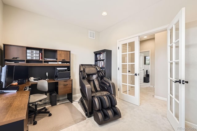 office featuring visible vents, light carpet, baseboards, recessed lighting, and french doors
