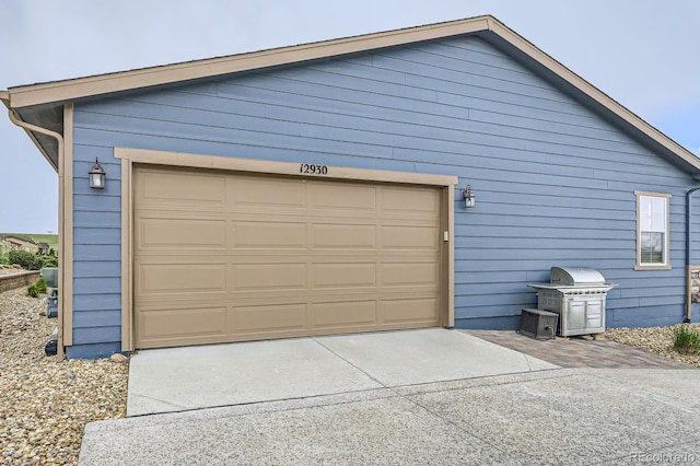 garage with driveway