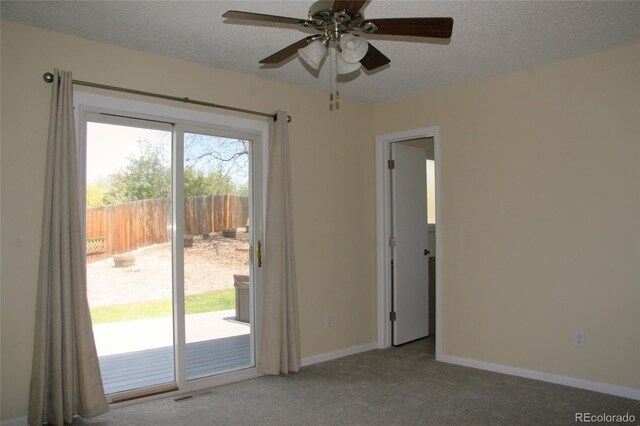 1008 Park View Ct, Castle Rock, CO 80104 - carpeted empty room with a ceiling fan, baseboards, and a textured ceiling