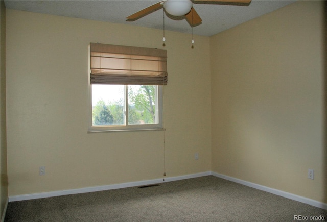 1008 Park View Ct, Castle Rock, CO 80104 - spare room featuring ceiling fan, carpet flooring, and baseboards