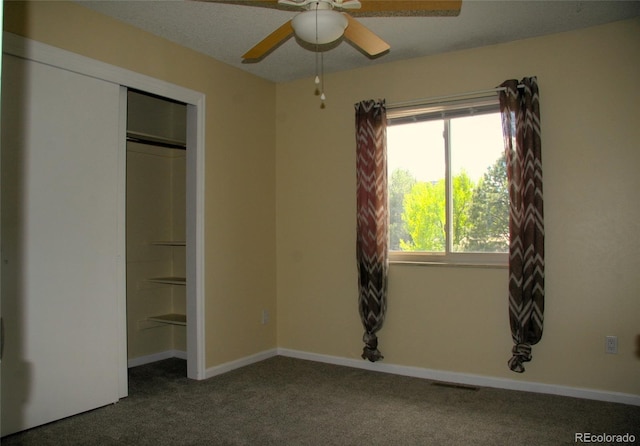 1008 Park View Ct, Castle Rock, CO 80104 - unfurnished bedroom with carpet floors, a closet, baseboards, and a ceiling fan