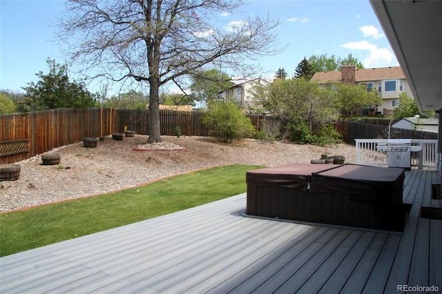 1008 Park View Ct, Castle Rock, CO 80104 - wooden deck with a hot tub and a fenced backyard