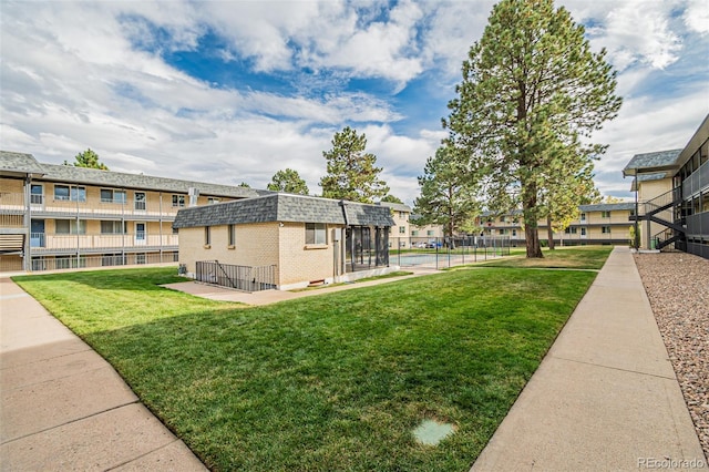 surrounding community featuring a lawn