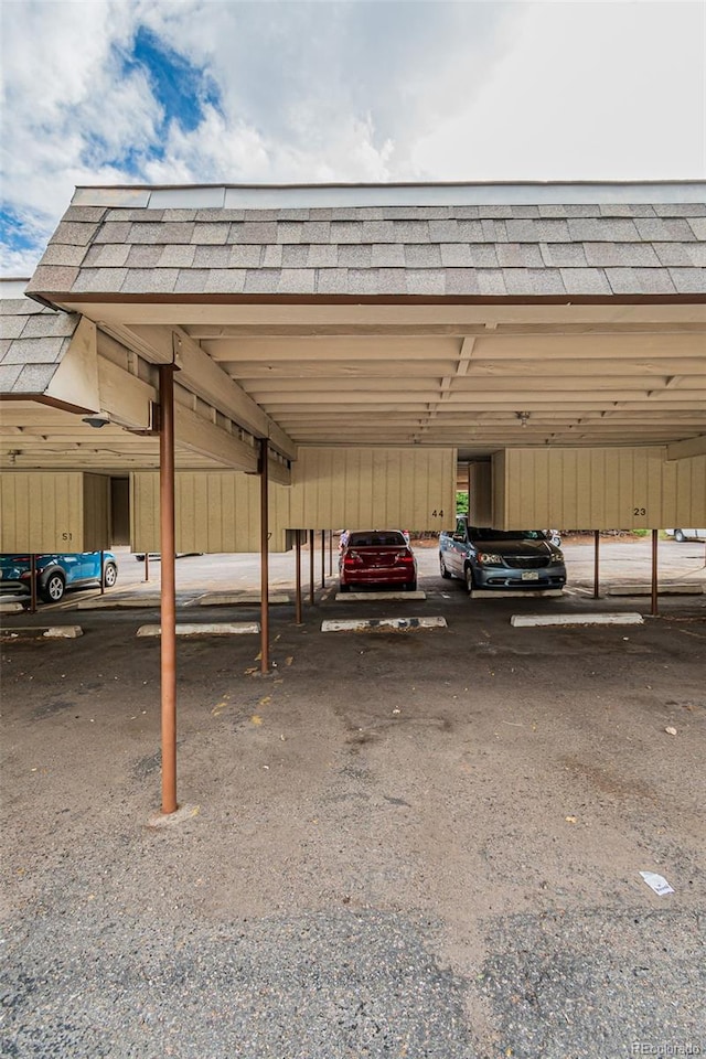 view of car parking featuring a carport