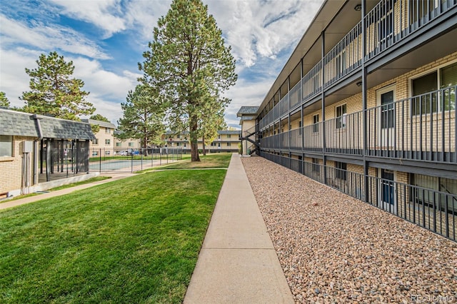 surrounding community featuring a yard