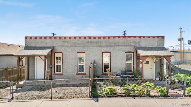 741 Mariposa St, Denver, CO 80204 - view of property with a fenced front yard