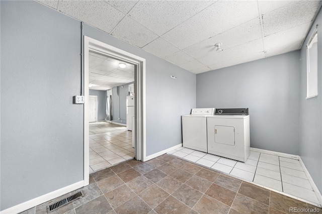 741 Mariposa St, Denver, CO 80204 - washroom with independent washer and dryer and baseboards