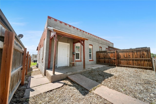 741 Mariposa St, Denver, CO 80204 - back of house with a fenced backyard and a patio