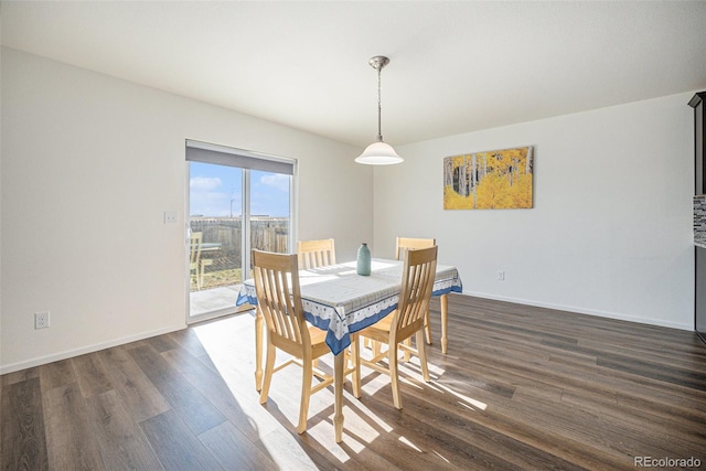 dining room featuring dark wood-type flooring