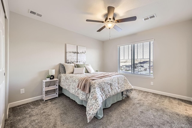 bedroom featuring baseboards, carpet flooring, and a ceiling fan