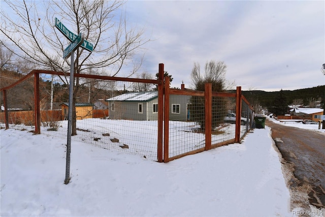 view of yard covered in snow